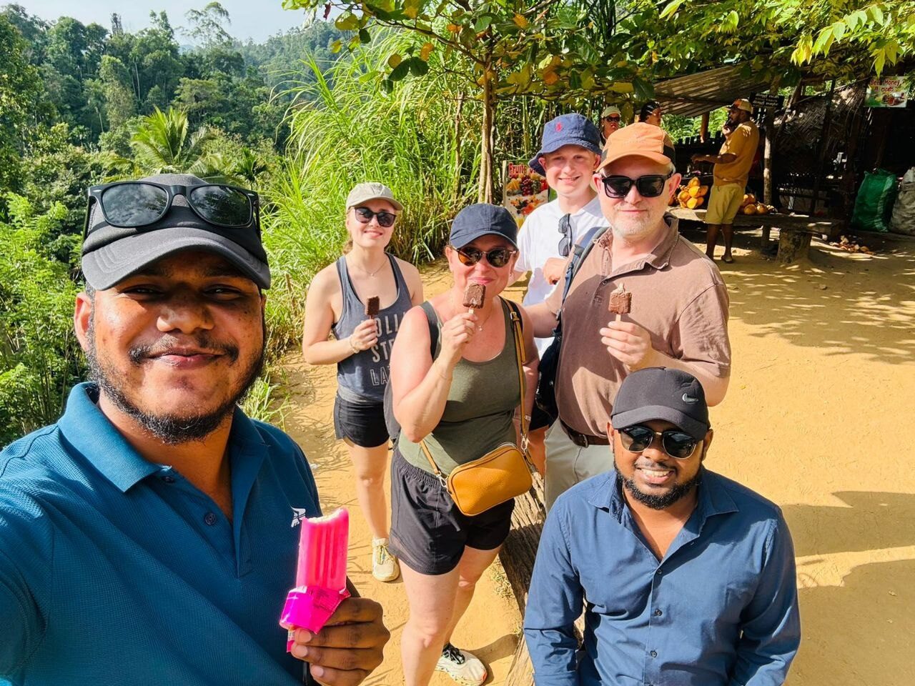 Kayeli Lanka guide with a group of tourists on a scenic walking trail