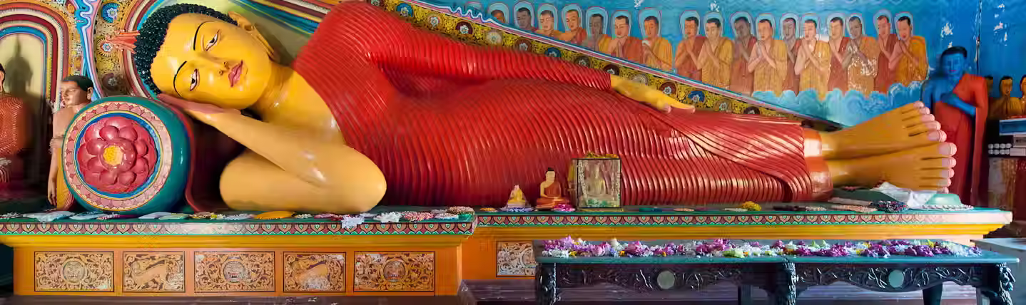 Reclining Buddha statue carved in stone