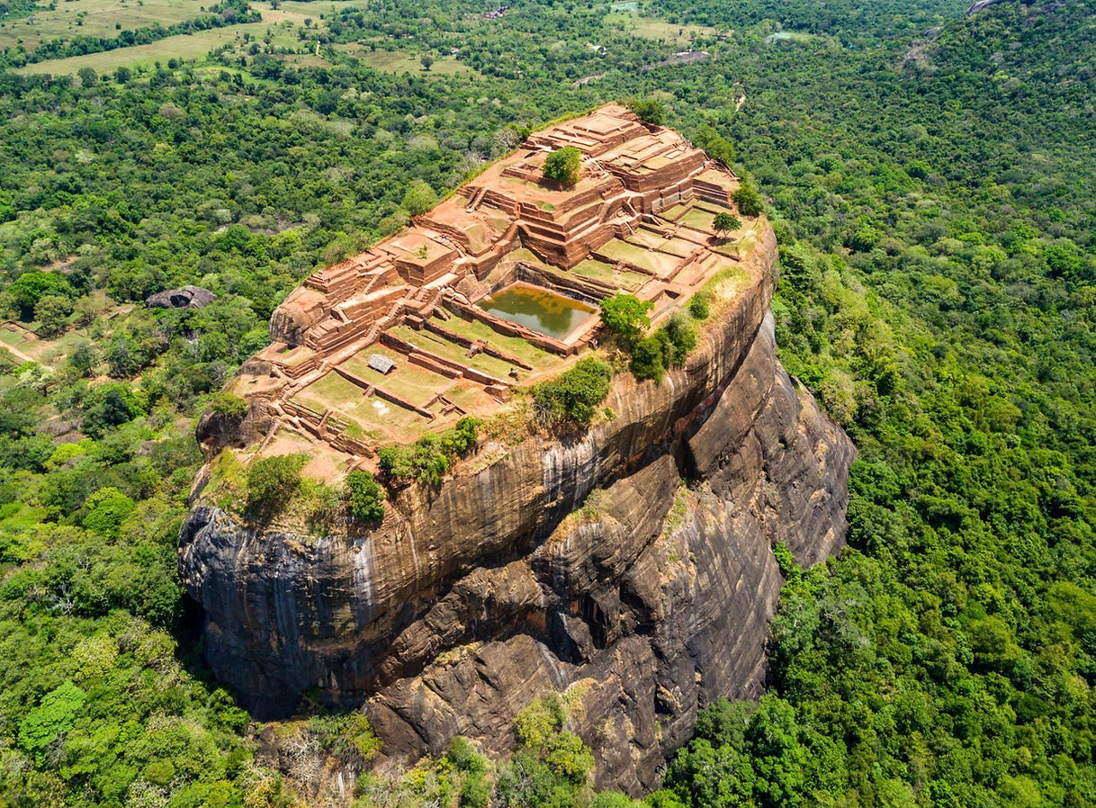 Sigiriya rock fortress rising above the surrounding jungle